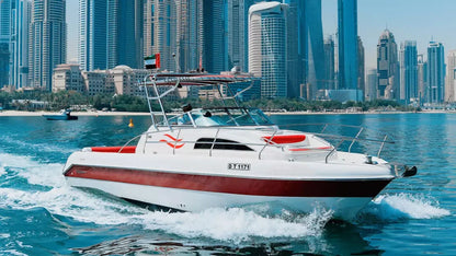 Speedboat on water with city skyline in the background